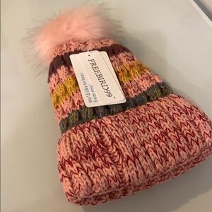Freebird99 toque with faux fur pompom